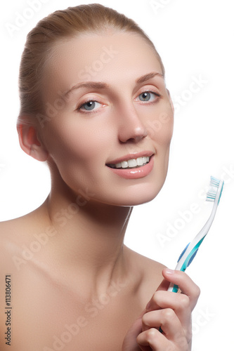 Beautiful woman with toothbrush. Dental care background