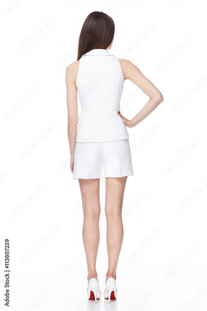 Young sexy beautiful female model in white short suit Young sexy beautiful female model in white short suit