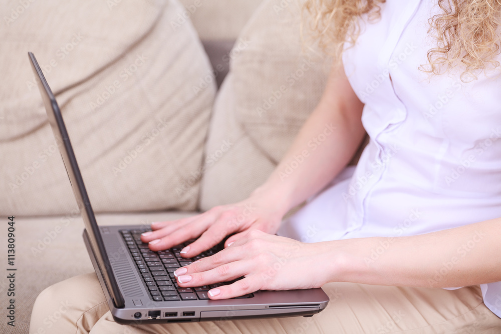 Woman sitting with laptop Woman sitting with laptop