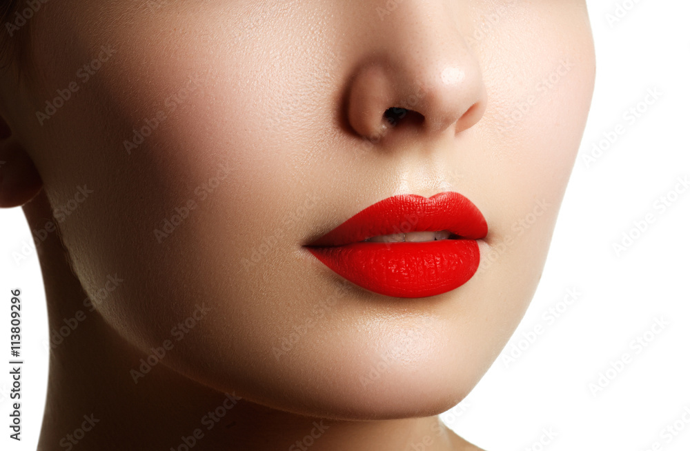 Close-up shot of woman lips with red lipstick. Beautiful perfect makeup Close-up shot of woman lips with red lipstick. Beautiful perfect makeup