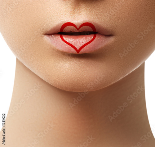 Valentine heart kiss on the Lips. Makeup. Beauty sexylips photo