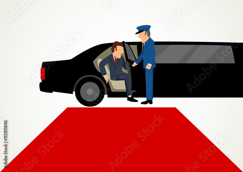 Businessman getting out from limousine