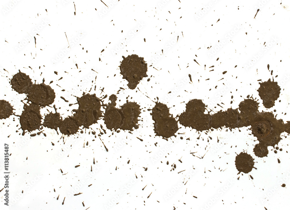 drops of mud sprayed a white background drops of mud sprayed a white background