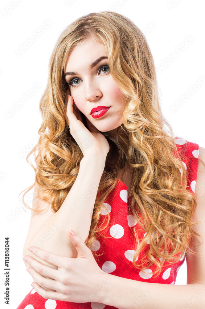 Blonde sexy girl in a red dress with beautiful hair close-up portrait on a white background. Blonde sexy girl in a red dress with beautiful hair close-up portrait on a white background.