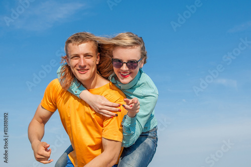 Happy young joyful guy and girl © Malsveta