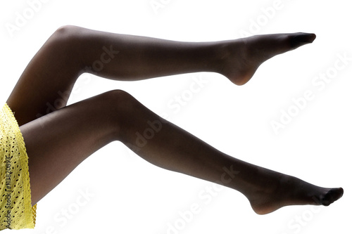 Close-up of woman legs in black stockings