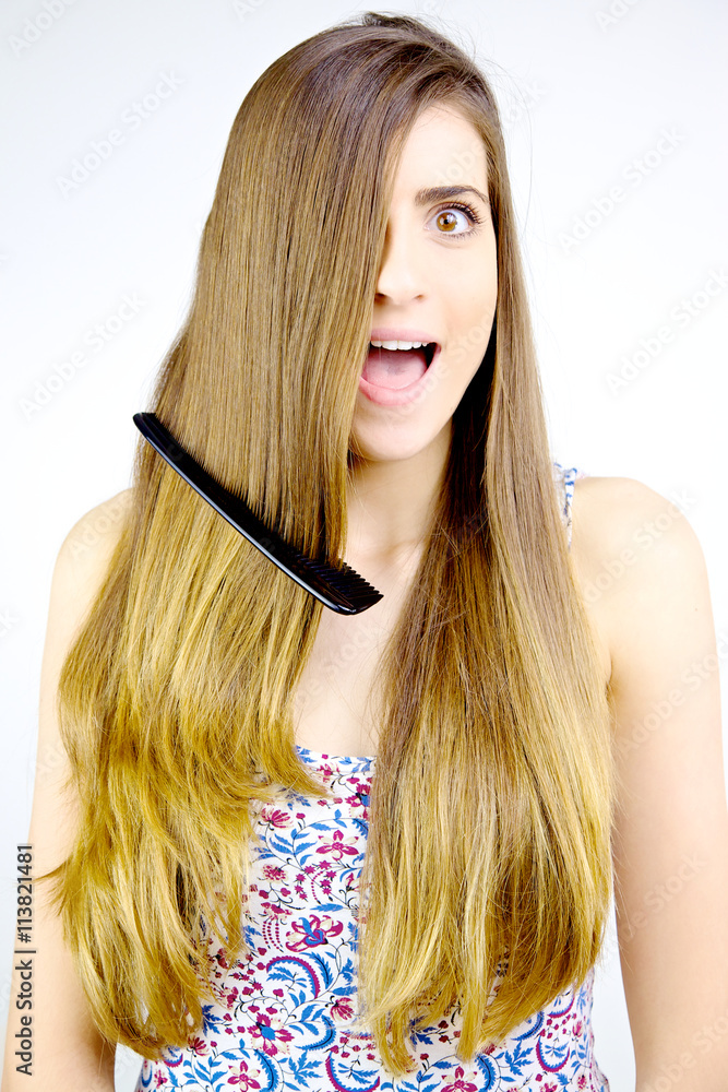 Woman with comb stock in hair screaming scared medium shot Woman with comb stock in hair screaming scared medium shot