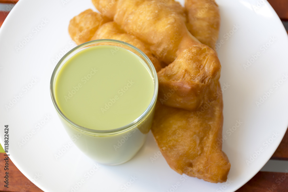 Deep-fried dough stick and green soybean milk Deep-fried dough stick and green soybean milk