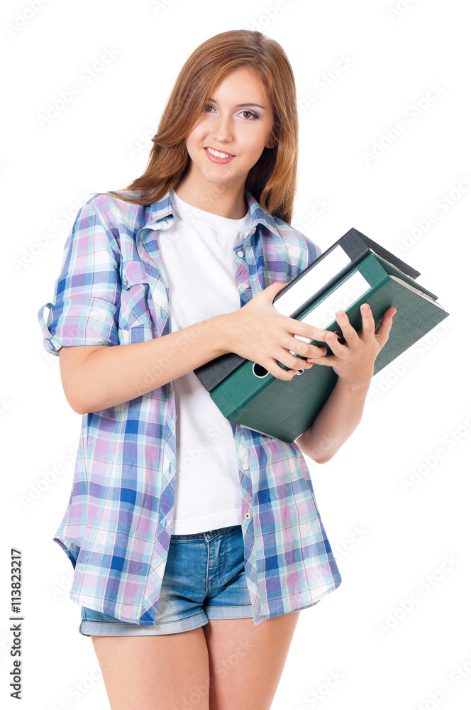 Portrait of a smiling cute teen girl with folders and looking at camera, isolated on white background Portrait of a smiling cute teen girl with folders and looking at camera, isolated on white background