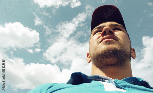 Photos The man on the sky background - view from below