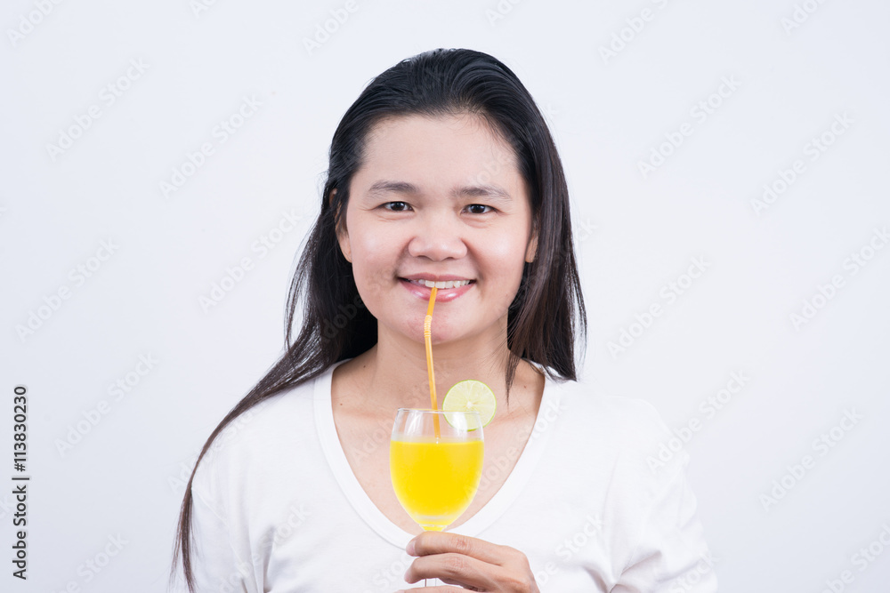 Woman drinking lemonad. Healthy food . Skin care and beauty. On Woman drinking lemonad. Healthy food . Skin care and beauty. On
