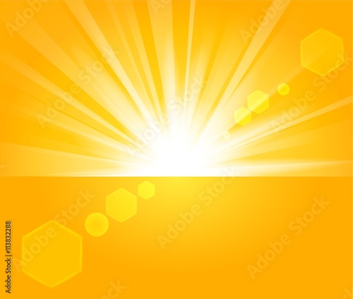 Golden Rays rising from horizon in light background