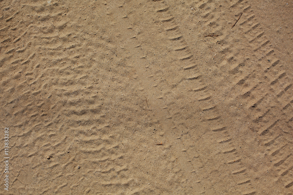 Obraz premium texture tread marks in the sand