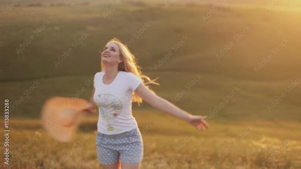 woman spinning and smiling in nature woman spinning and smiling in nature