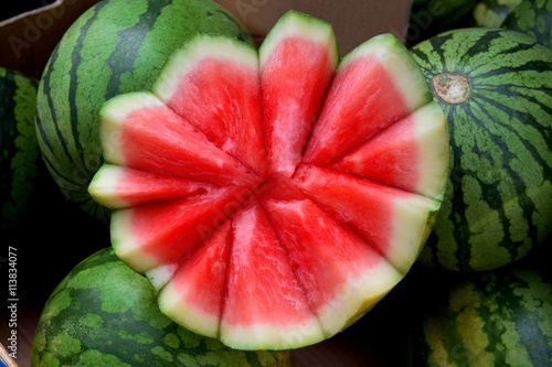 Ripe watermelon in market in Birmingham city center. Sliced fresh watermelon in the market