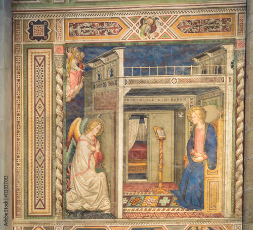 Old rainassance fresco painting of the Annunciation of the Archangel Gabriel to the Virgin Mary, on the wall of the cathedral of Santa Maria del Fiore in Florence. photo