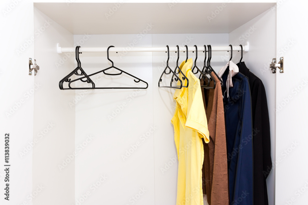 Obraz premium Wardrobe with a few pieces of clothing