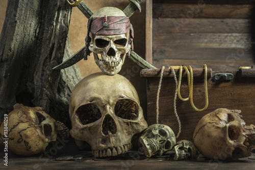 closeup pirate skull over on human skull pile awesome