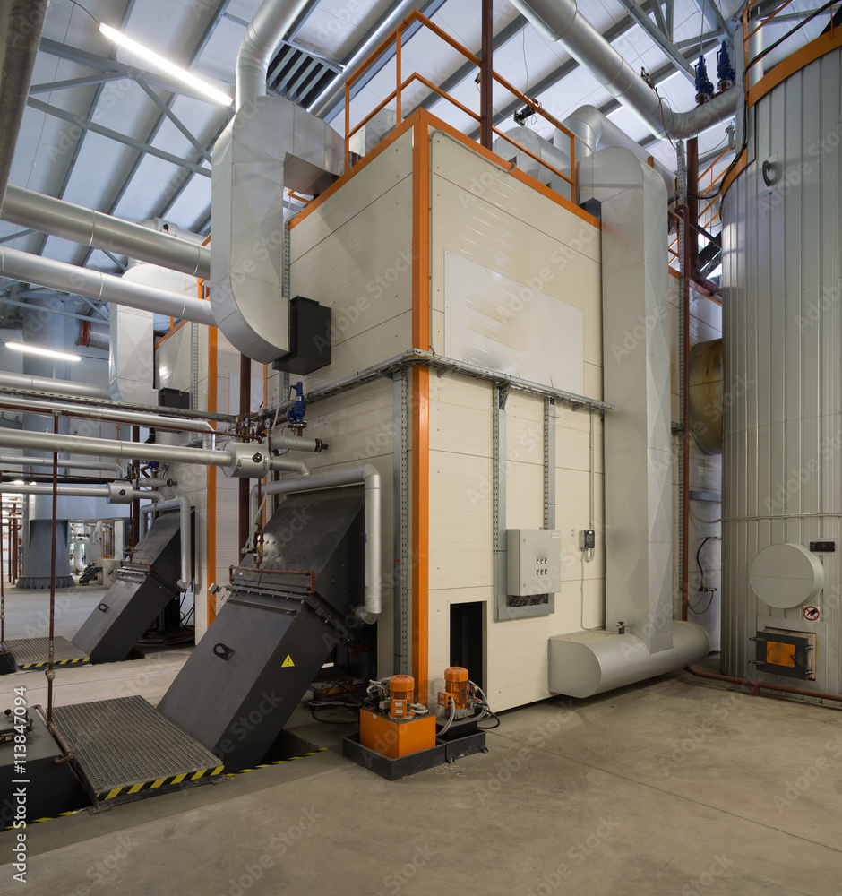 Modern boiler room on the wooden chips. Modern boiler room on the wooden chips.