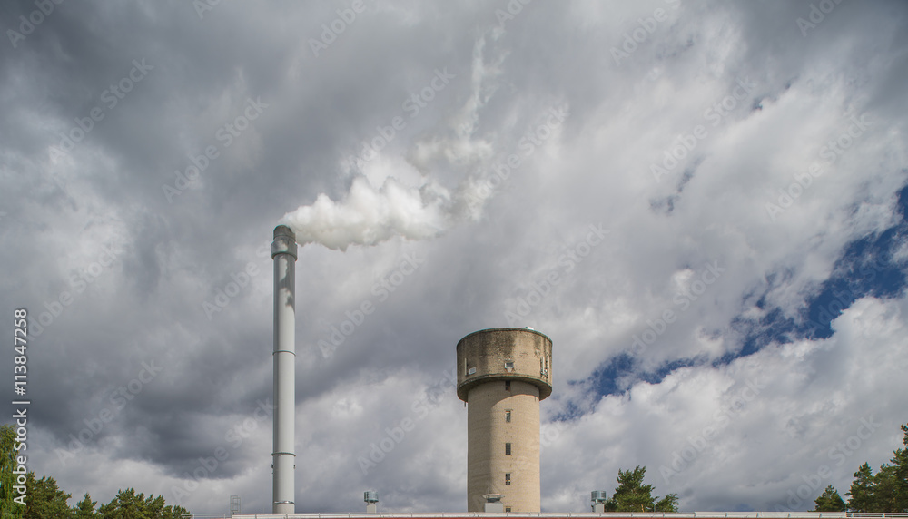 Modern boiler house. Smoke comes out of the pipe. Modern boiler house. Smoke comes out of the pipe.