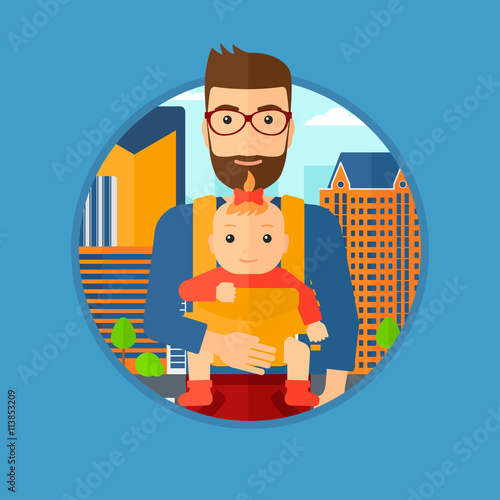 Father carrying his daughter in sling.