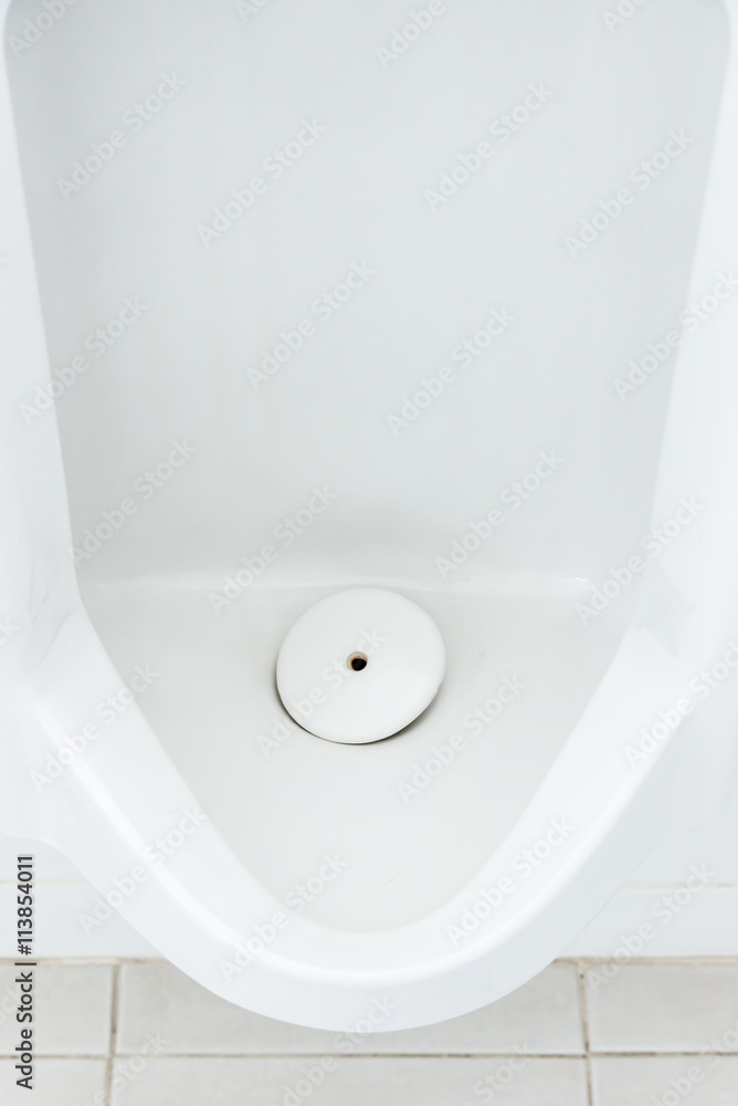 Fototapeta premium Closeup of dirty white urinals