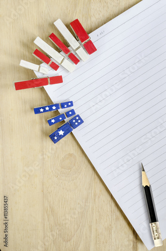 Billede på lærred lank note book with  blue,red and white wooden  clamp