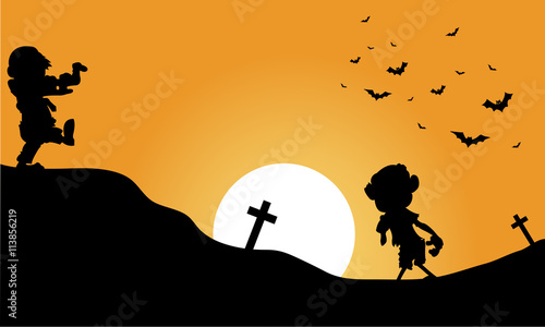 Silhouette of zombie and bat halloween