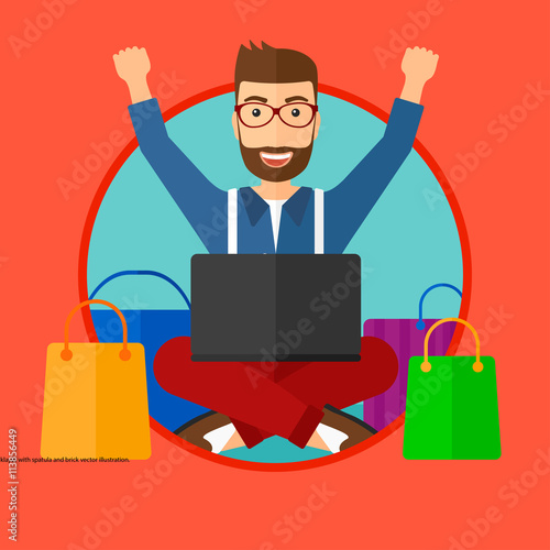 Man shopping online using his laptop.