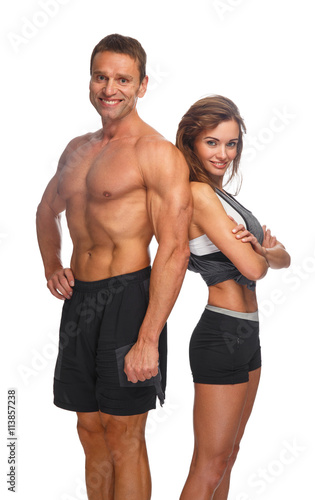 Sporty couple isolated on a white background.