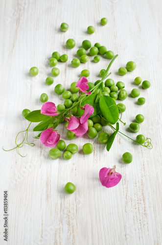 Green peas with pink blossom