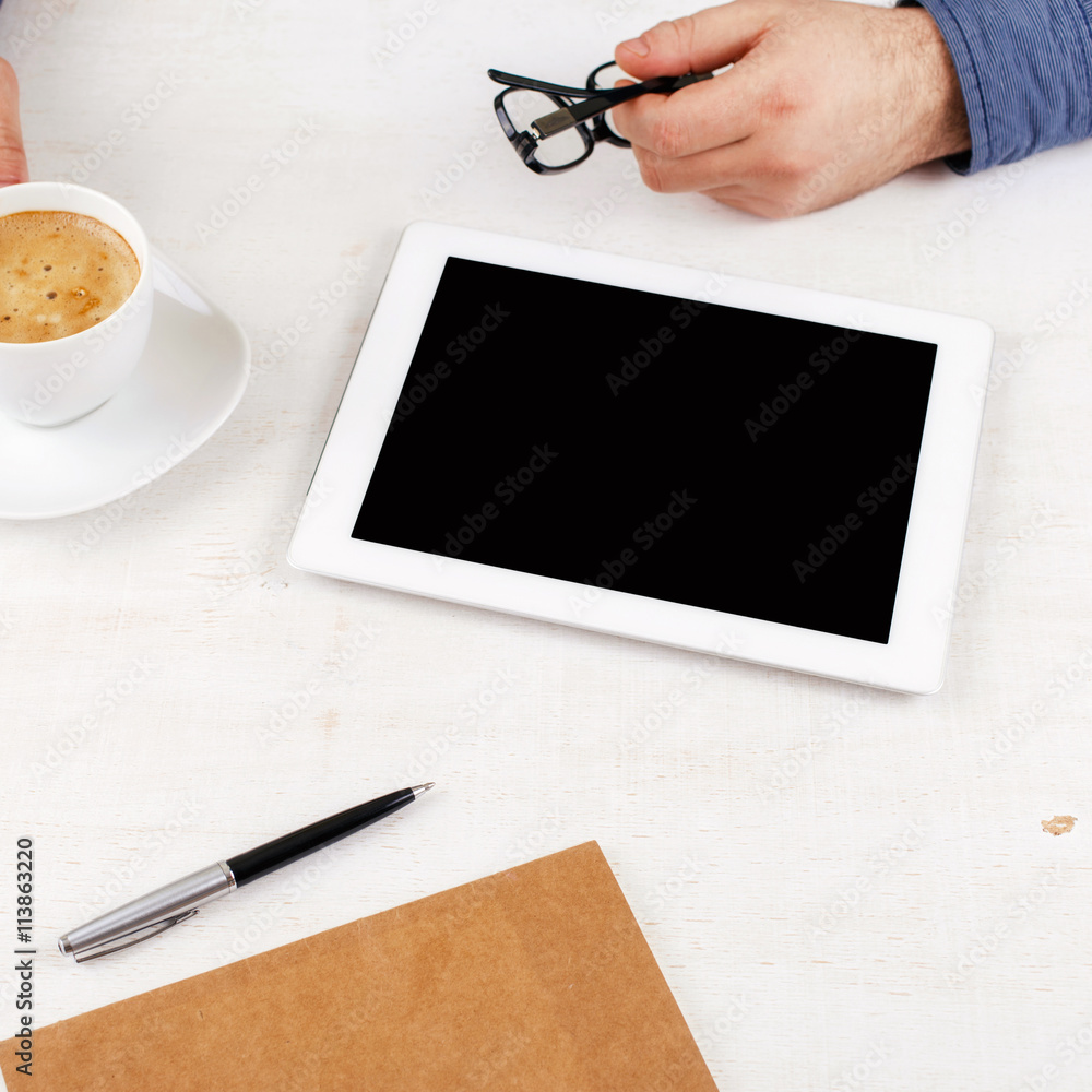 Man working using a tablet Man working using a tablet