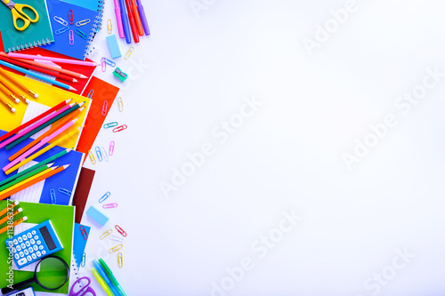 School supplies on a white background with copy space