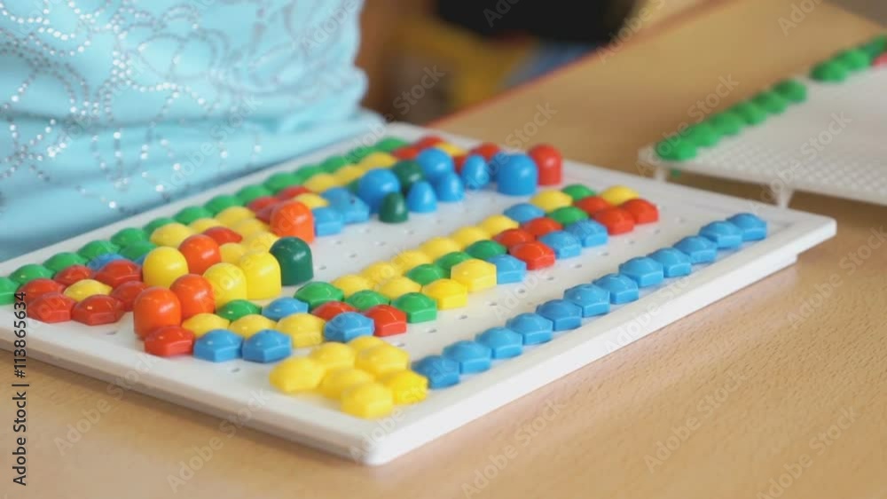 Child plays the intellectual educational game Child plays the intellectual educational game