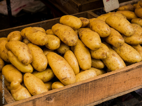 Potatoes in the Wooden at Market photo