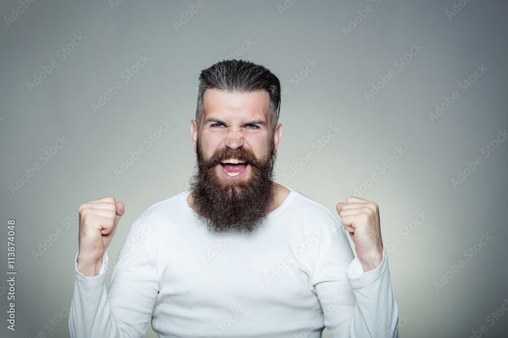 Bearded man with happy yes gesture Bearded man with happy yes gesture