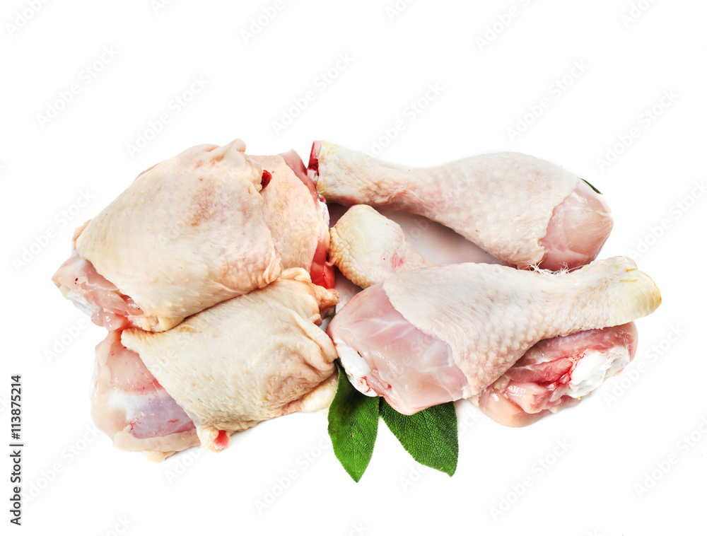 RAW CHICKEN LEGS AND BREAST ISOLATED ON WHITE