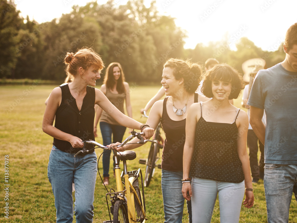 large group of friends together in a park having fun, back to school Stock Photo Adobe Stock