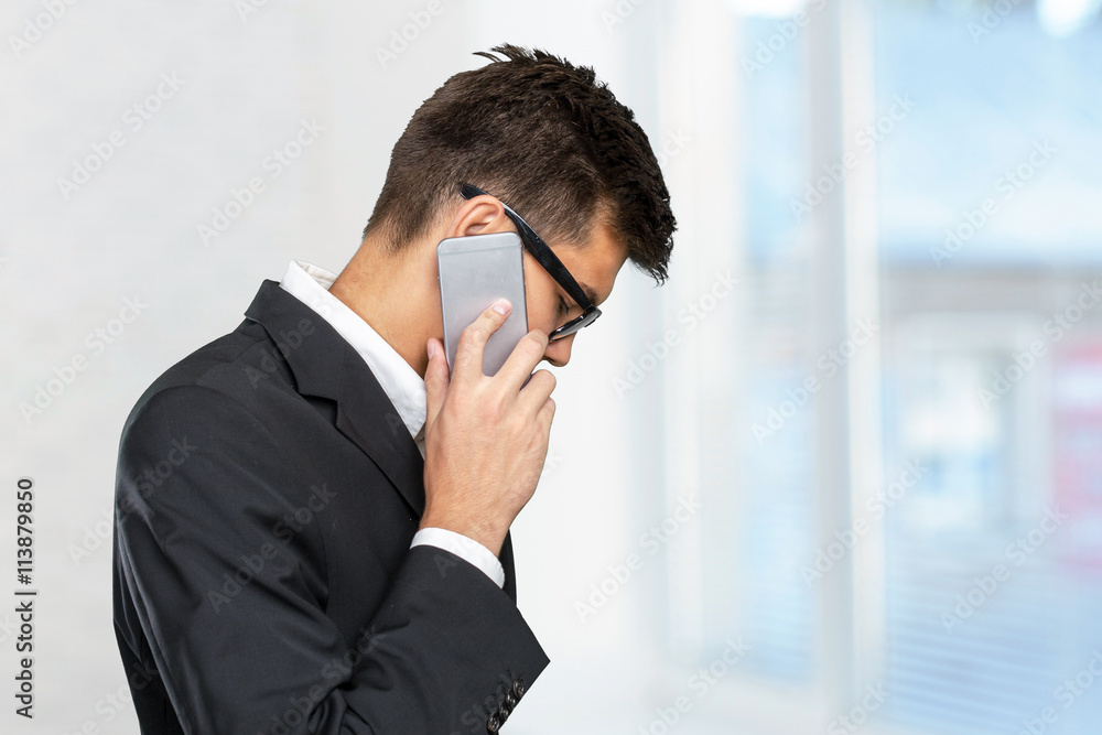 Portrait of a cheerful businessman talking on the phone Portrait of a cheerful businessman talking on the phone