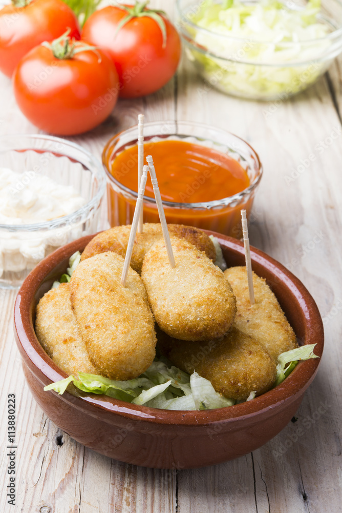 cod fish croquettes on dish