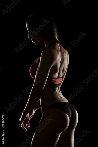 attractive fitness woman, trained female body, lifestyle portrai © podushko
