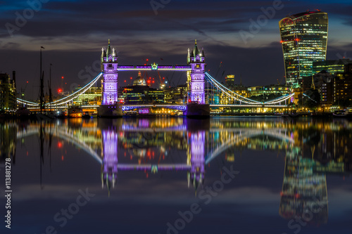 Illuminated London cityscape with Tower Bridge and 20 Fenchurch Street at sunset © I-Wei Huang