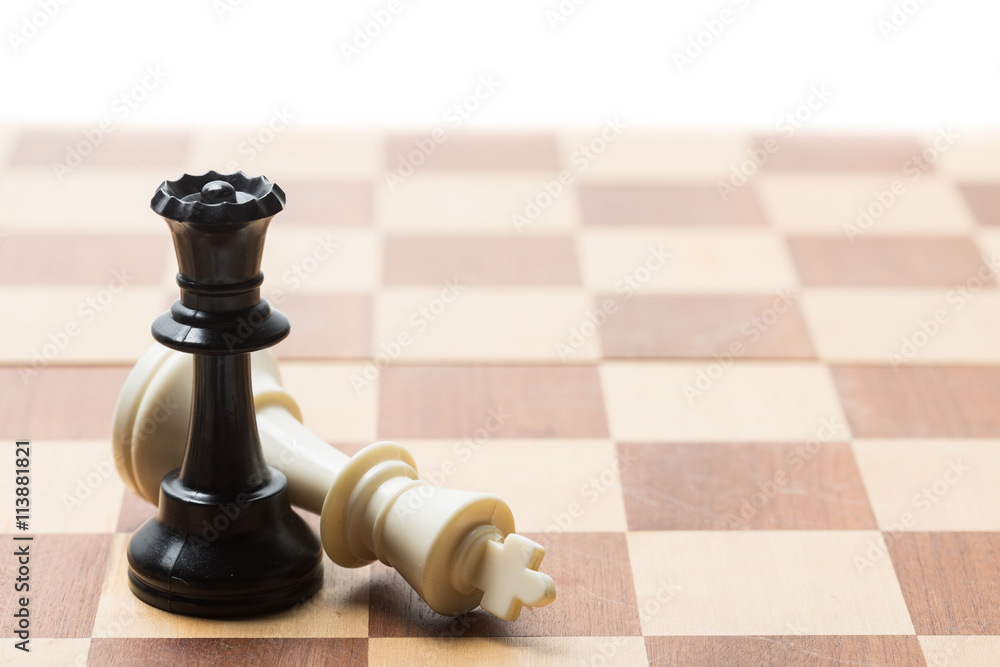 Chess pieces set on a chessboard Chess pieces set on a chessboard