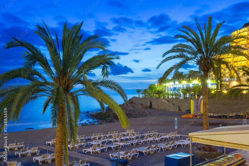 Fototapeta premium Promenade to the beach in Taurito at dusk, Gran Canaria island in Spain