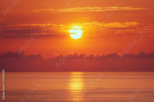 orange sunset over sea © mimadeo
