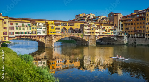 Famous Ponte Vecchio with river Arno at sunset in Florence  Italy