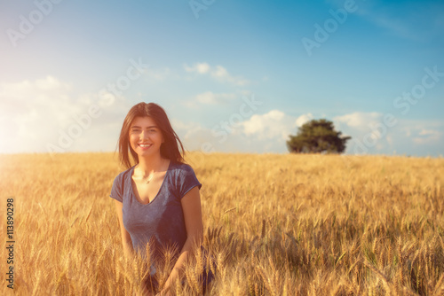 Smiling Woman on Wheat Farm