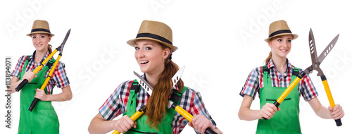 Young woman with shears on white