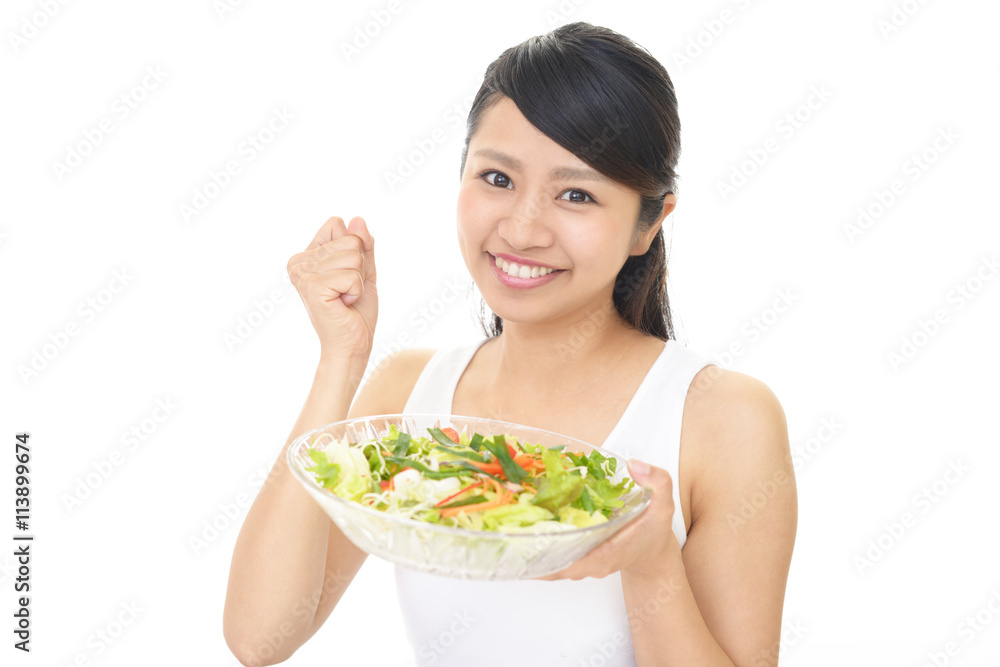 サラダを食べる女性 サラダを食べる女性