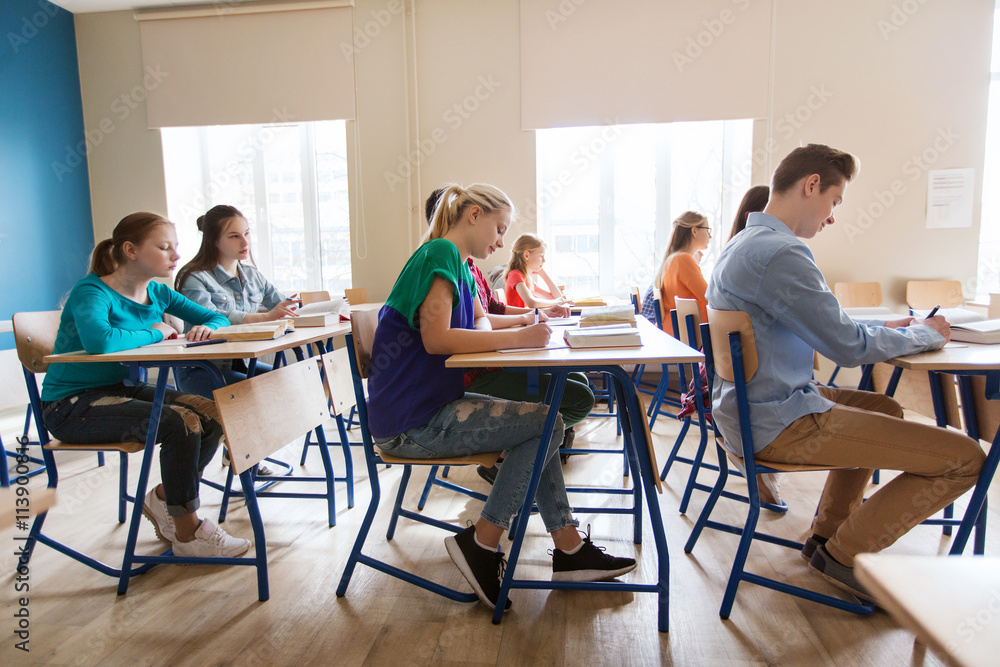 group of students with books writing school test group of students with books writing school test